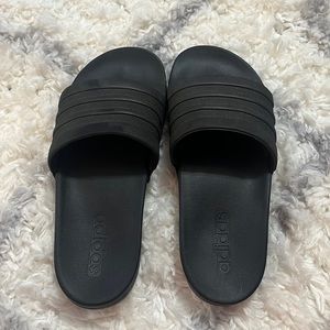 Women’s black adidas slides
